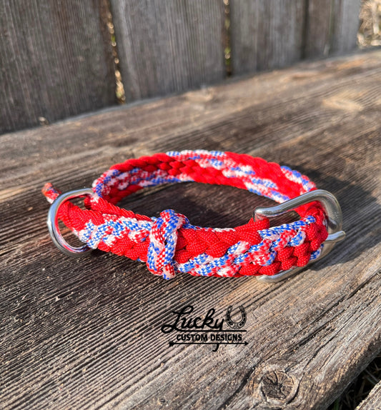 Each collar is handcrafted from four strands of premium 550 paracord, creating a strong and dependable collar built to withstand daily use. A durable buckle provides a secure fit, while the integrated D-ring makes it easy to attach a leash.&nbsp;
Designed with versatility in mind, these collars are adjustable to fit dogs of all sizes.

Small Collars are 20” long &amp; 3/4” thick
