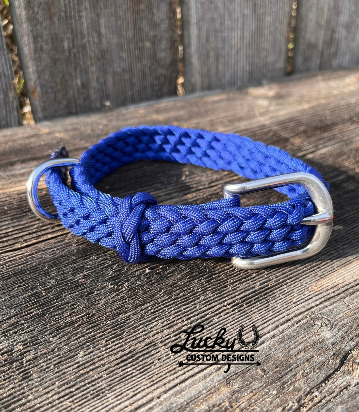 Each collar is handcrafted from four strands of premium 550 paracord, creating a strong and dependable collar built to withstand daily use. A durable buckle provides a secure fit, while the integrated D-ring makes it easy to attach a leash.&nbsp;
Designed with versatility in mind, these collars are adjustable to fit dogs of all sizes.

Small Collars are 20” long &amp; 3/4” thick