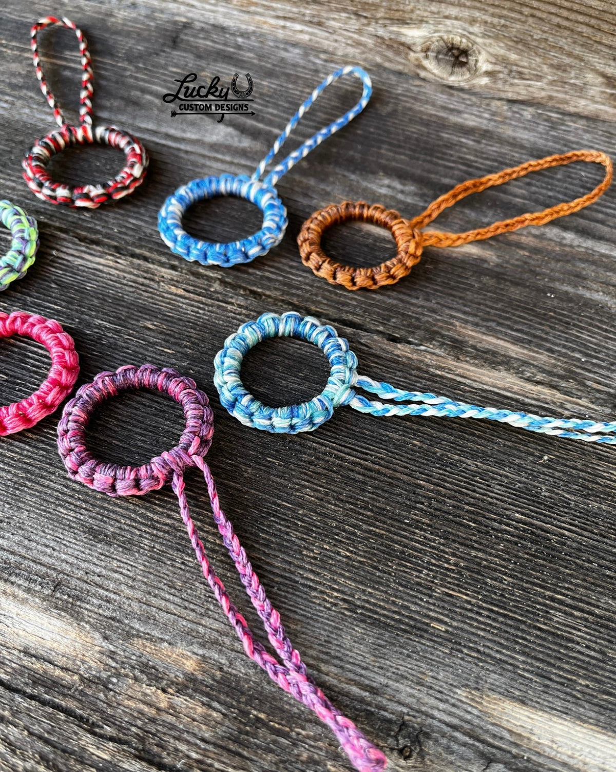 Sinew keychains made with various color combinations.