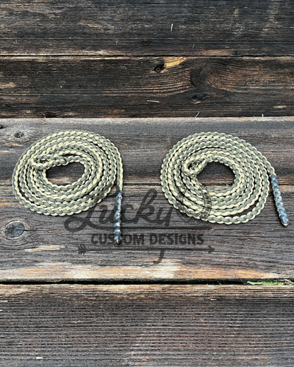 Various lengths of paracord tie ropes with a braided eye.