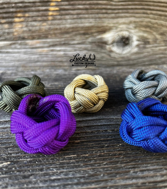 Simple wild rag slides out of one strand of paracord that's smooth on the inside and will keep your rag snug!