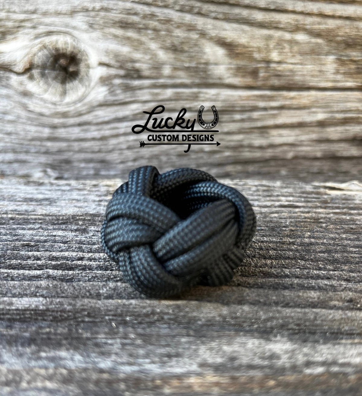 Simple wild rag slides out of one strand of paracord that's smooth on the inside and will keep your rag snug